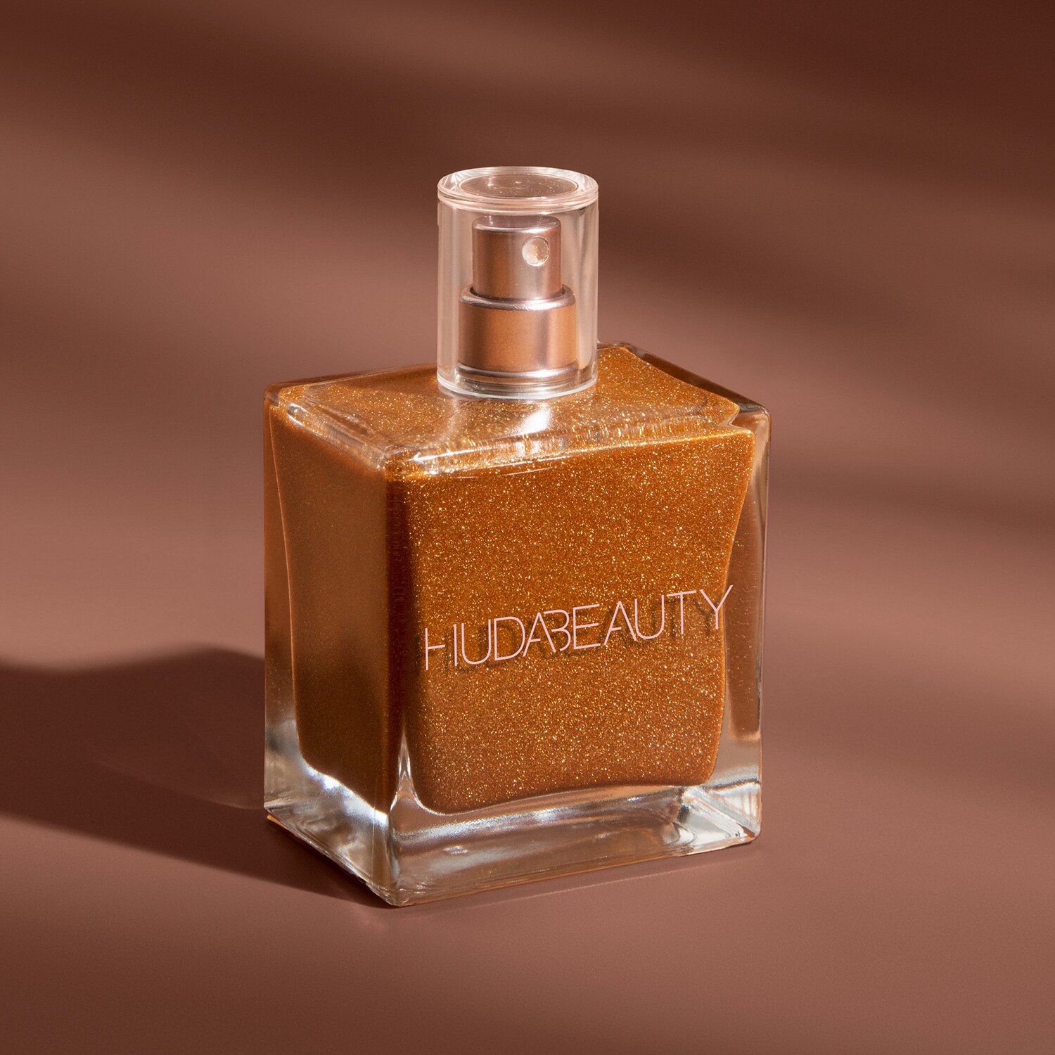 N.Y.M.P.H. Body Drip Shimmering Dry Oil Body oil von HUDA BEAUTY ≡